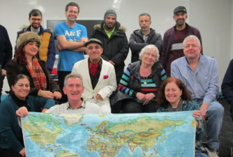 FAN friends holding a map of the world